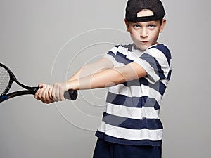 Child Boy Playing Tennis. Sport kids