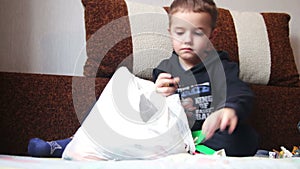 Child Boy Playing with Toys