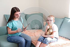 Child boy in the psychologists office