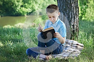child boy read Holy bible