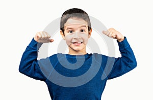 child boy showing his hand biceps