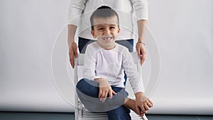 Child boy smiling to camera portrait, white race kid, ethnically diverse boy smile on white background, Woman have fun