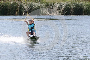 Child boy wake boarding