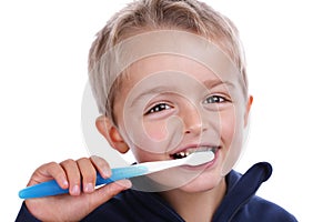 Child brushing teeth