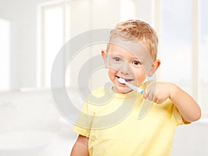 Child brushing teeth