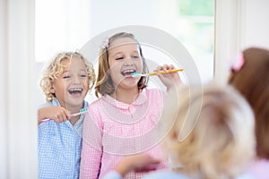 Child brushing teeth. Kids with toothpaste, brush