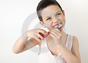 Child brushing teeth