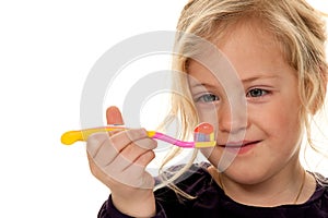 Child brushing teeth. Toothbrush and toothpaste