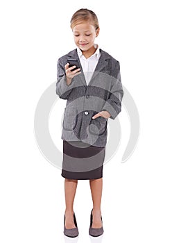 Child, business and typing an email on phone in studio communication and network on white background. Female person