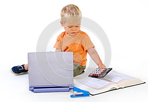 Child with a calculator and a law book