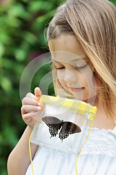 Child Capturing Butterflies