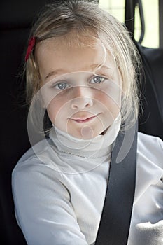 Child in car with seatbelt