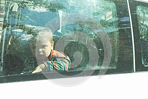 Child through a car window