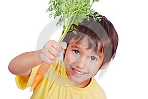 Child with a carrot in hand