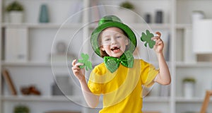 Child is celebrating St. Patrick`s Day