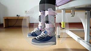 Child cerebral palsy disability, legs orthosis.