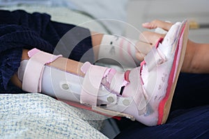 Child cerebral palsy disability, legs orthosis.