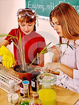 Child in chemistry class