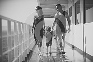 Child Childhood Children Happiness Concept. Family travelling on cruise ship on sunny day. Family rest concept. Father