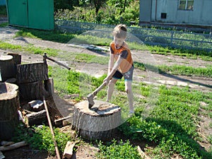 Child chopping wood