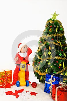Child and christmas tree