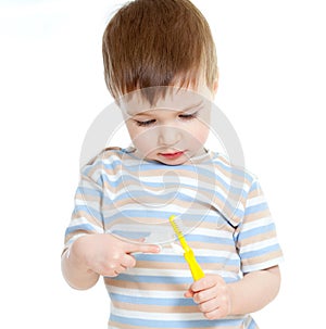 Child cleaning teeth isolated on white background