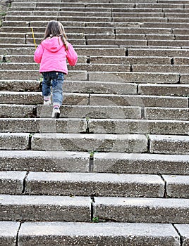 Child climb more stone stairs