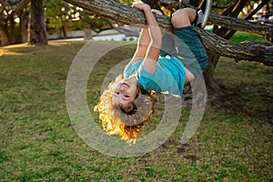 Child climbing in adventure activity park. Insurance kids. Health care insurance concept for kids. Medical healthcare