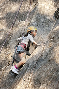 Child climbing, Alps, ArÃªches