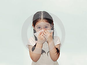 Child cold flu illness tissue blowing runny nose