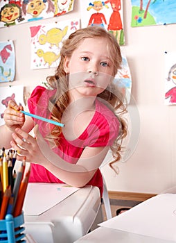 Child with colorful pencil .