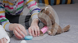 Child Combing For A Toy