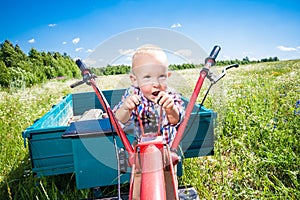 Child controls the cultivator