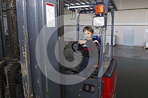 The child controls the loader.