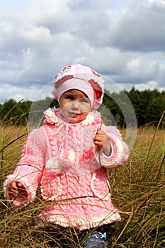 Child costs in a dry grass