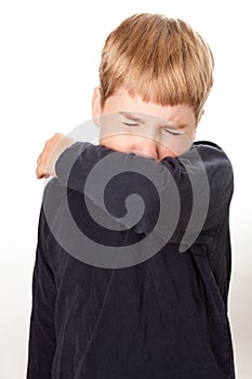 Child Coughing/Sneezing into Elbow