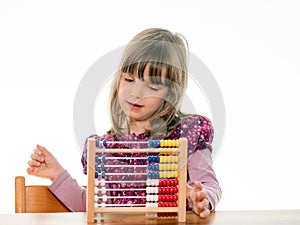 Child counts with abacus