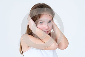 Child covering ears hands disobedience naughtiness