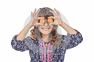 Child Covering Her Eyes With Carrots, Promoting Healthy Eating Habits At A Young Age