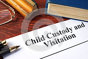 Child Custody and Visitation written on a paper.