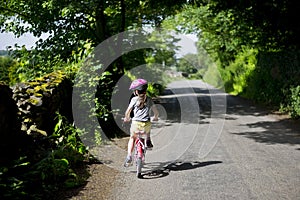 Child cycling a bike