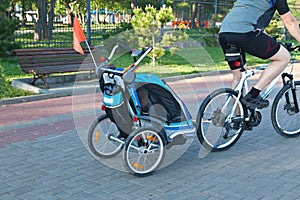 Child on cycling in carriage