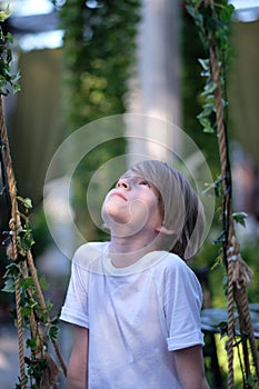 A child in a decorated pavilion