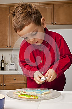 Child Decorating Cookies