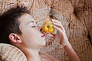 Child with delicious apple