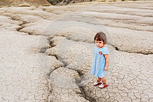 Child in a desert land