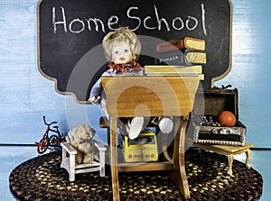 Child at desk being home schooled photo