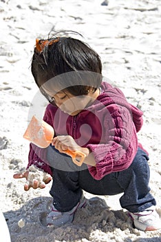 child digging for treasure