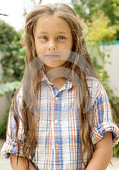 Child with disheveled hair