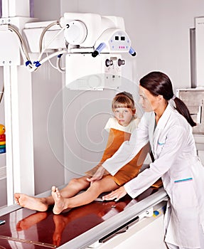 Child with doctor radiologist. photo